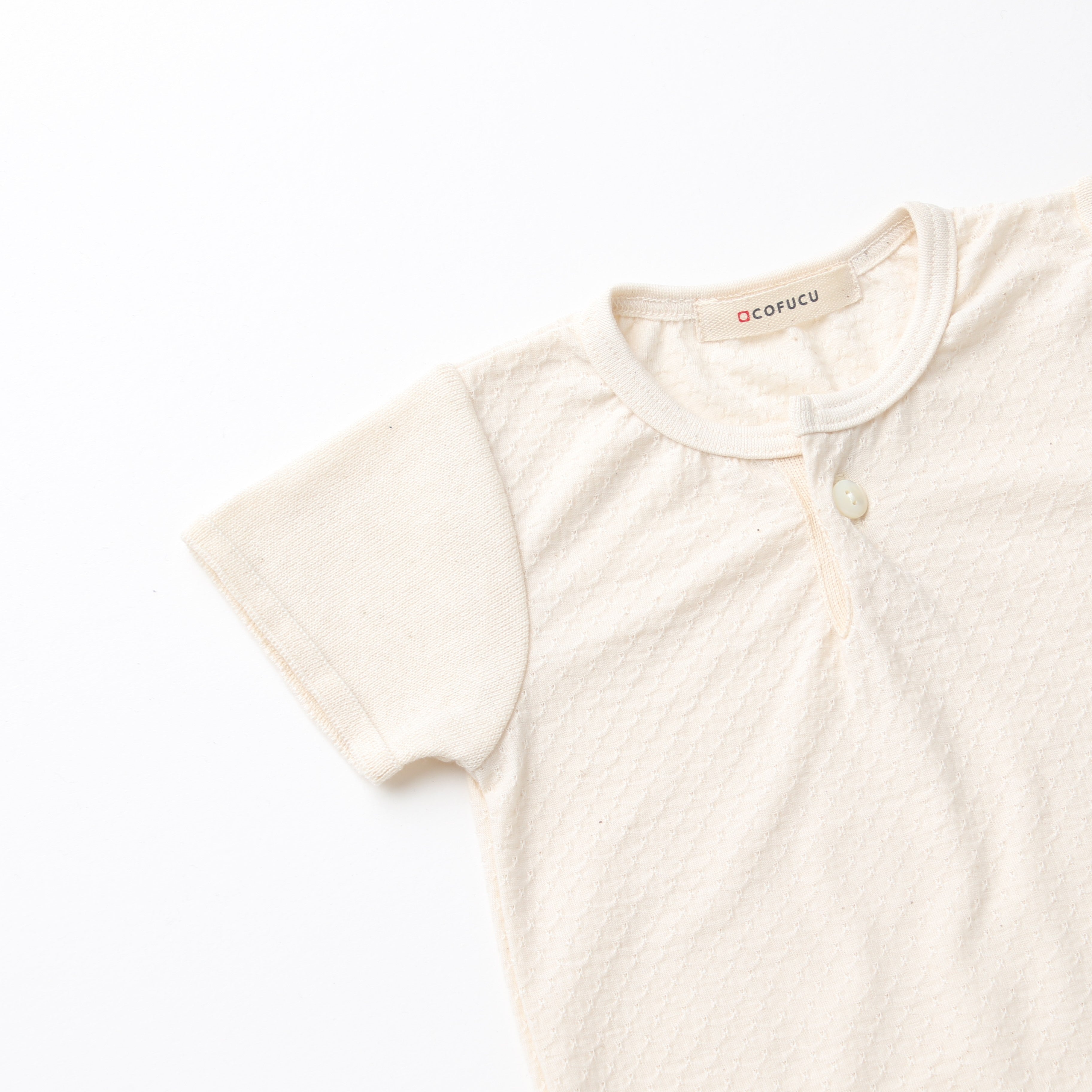 アイレット柄ボディースーツ