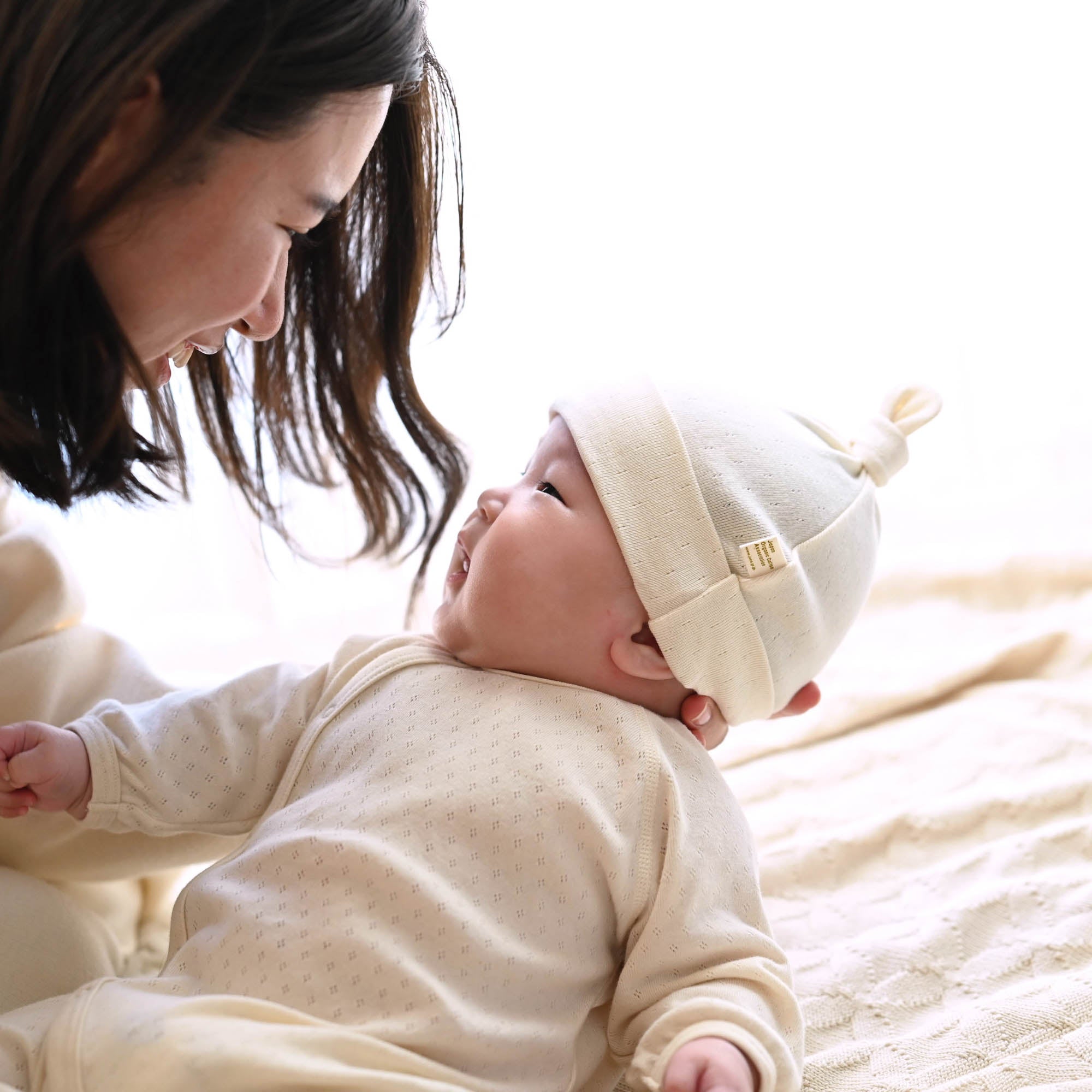 アイレット柄フライス生地結び帽