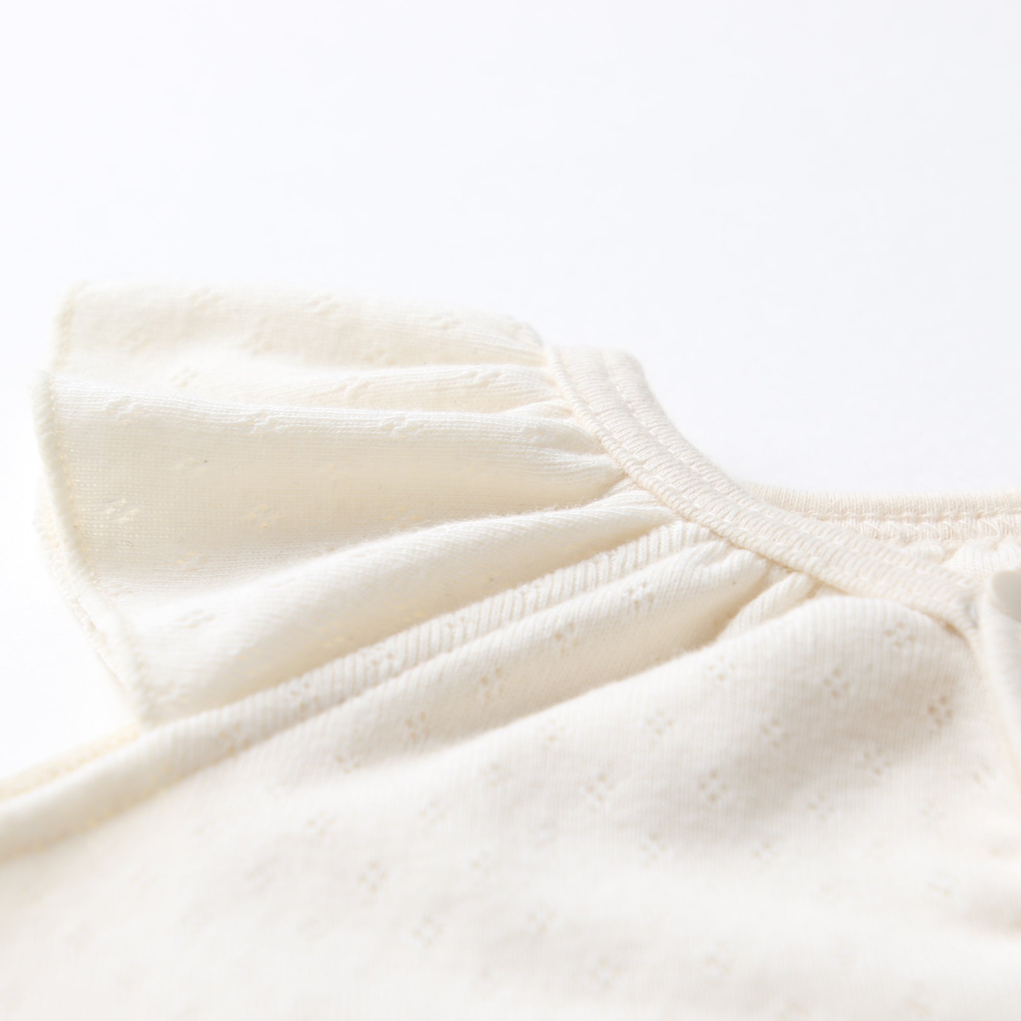 フリル袖ロンパース