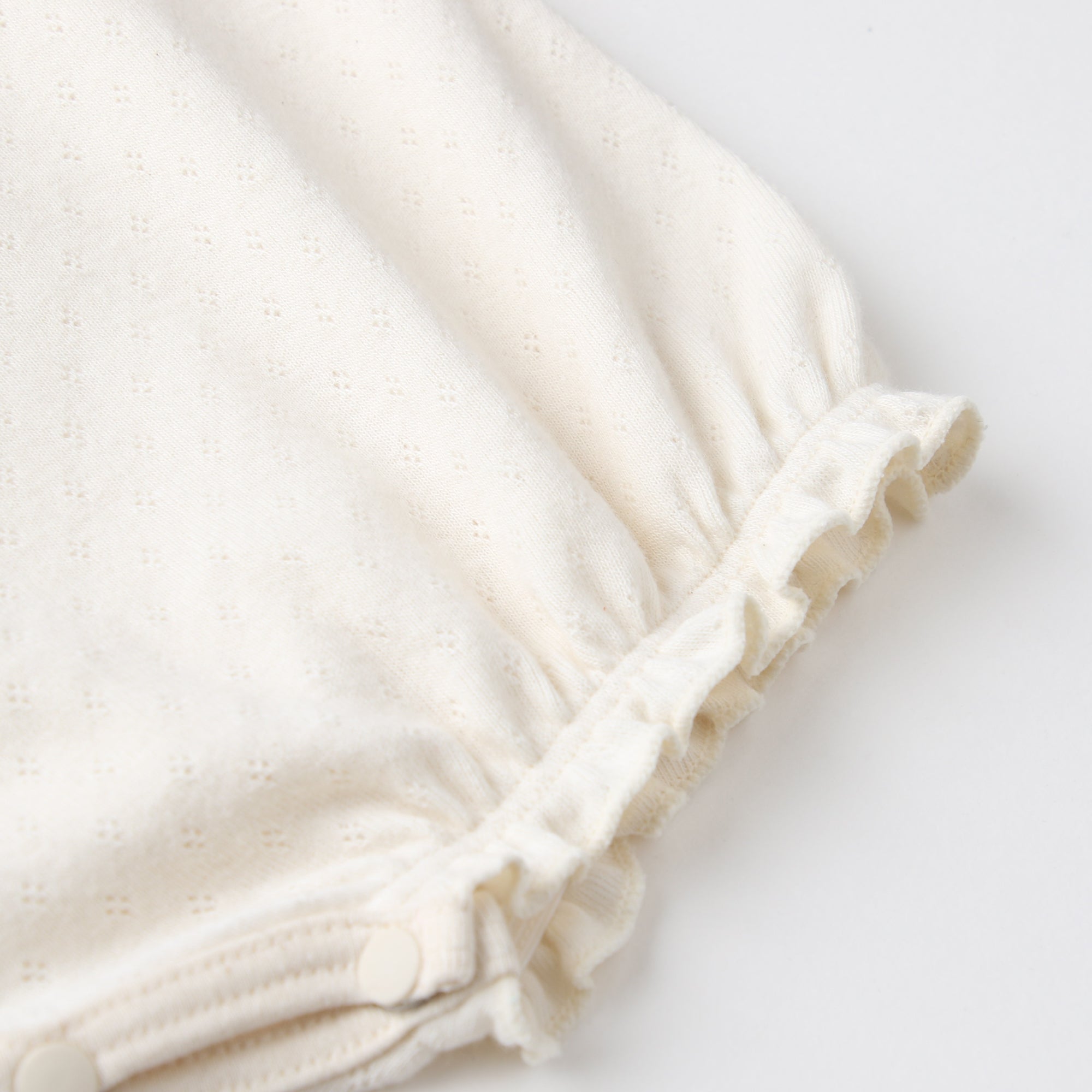 フリル袖ロンパース