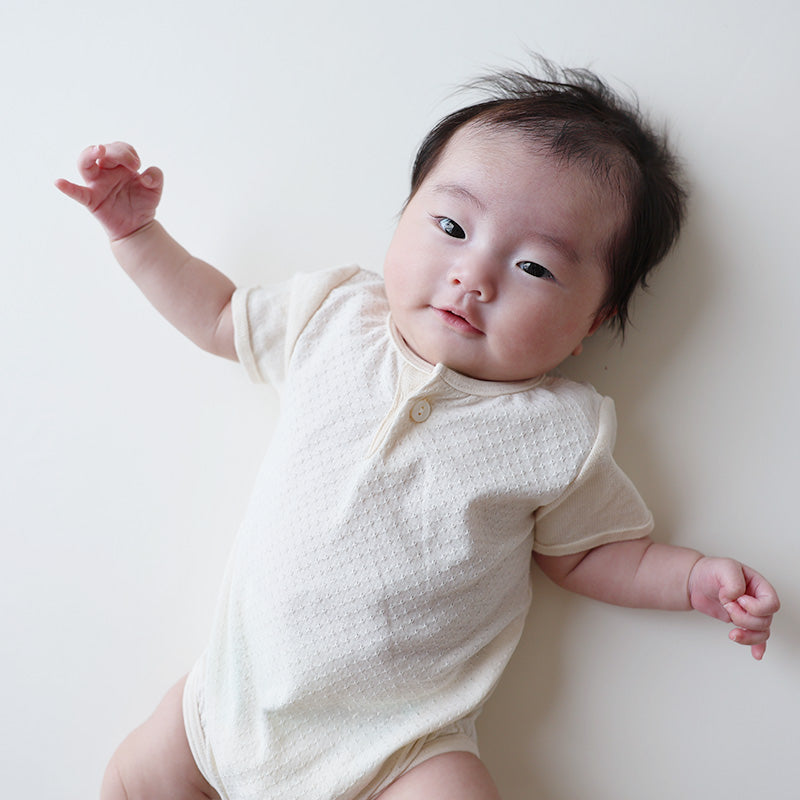 アイレット柄ボディースーツ