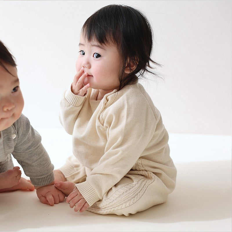 ラグランカバーオール 縄編み